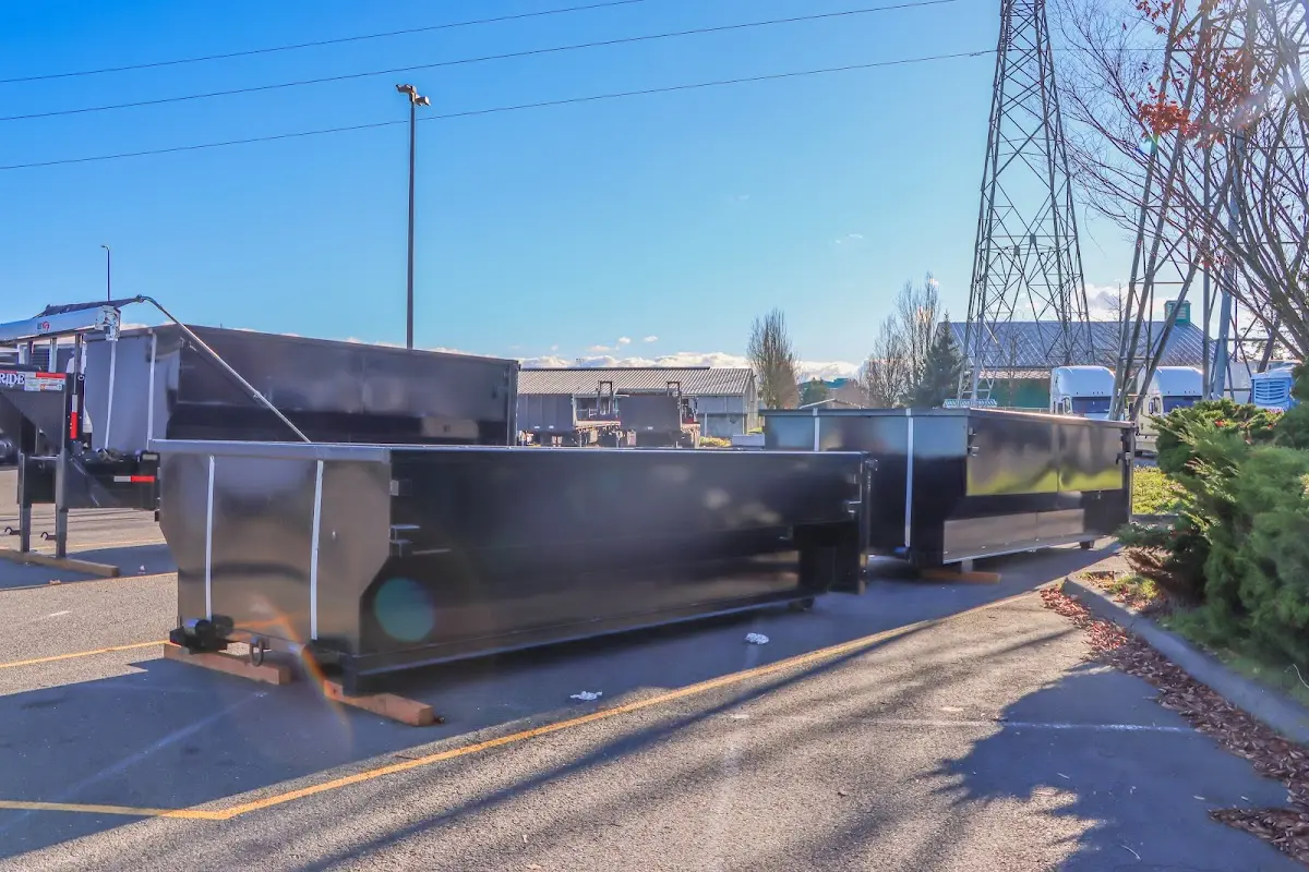 Roll-off dumpster ready for waste disposal at job site for 30 Yard Dumpster Rental in Crawfordville